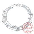 Sterling silver armband dam med kulor och zirkon – elegant flertrådsdesign
