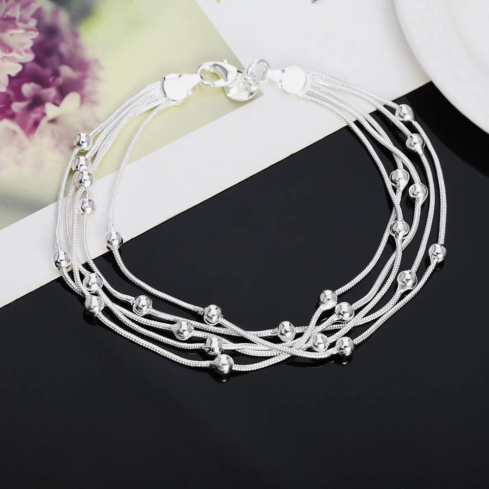 Sterling silver armband dam med kulor och zirkon – elegant flertrådsdesign