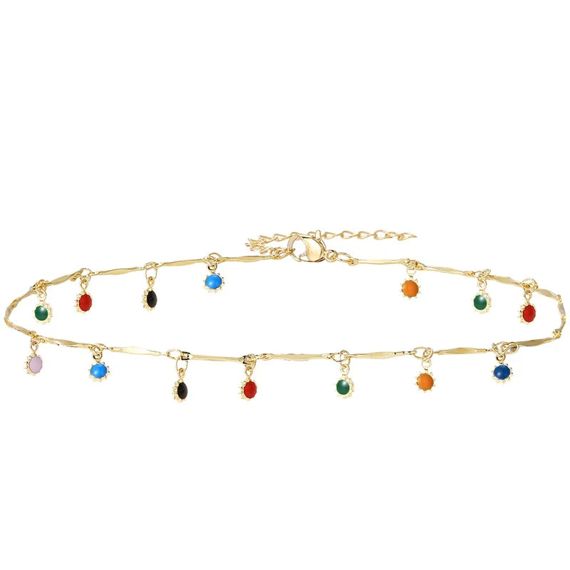 Färgglatt choker halsband med tofs – trendigt damsmycke