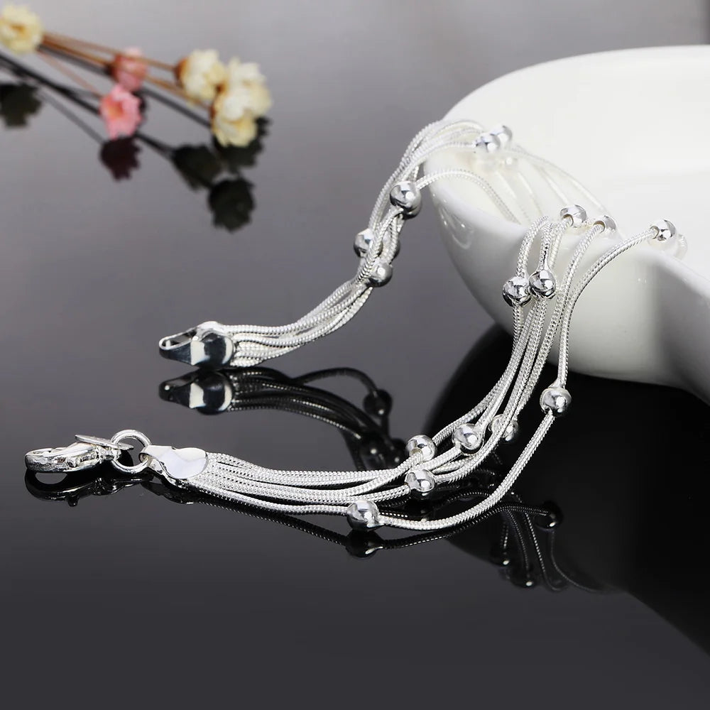 Sterling silver armband dam med kulor och zirkon – elegant flertrådsdesign