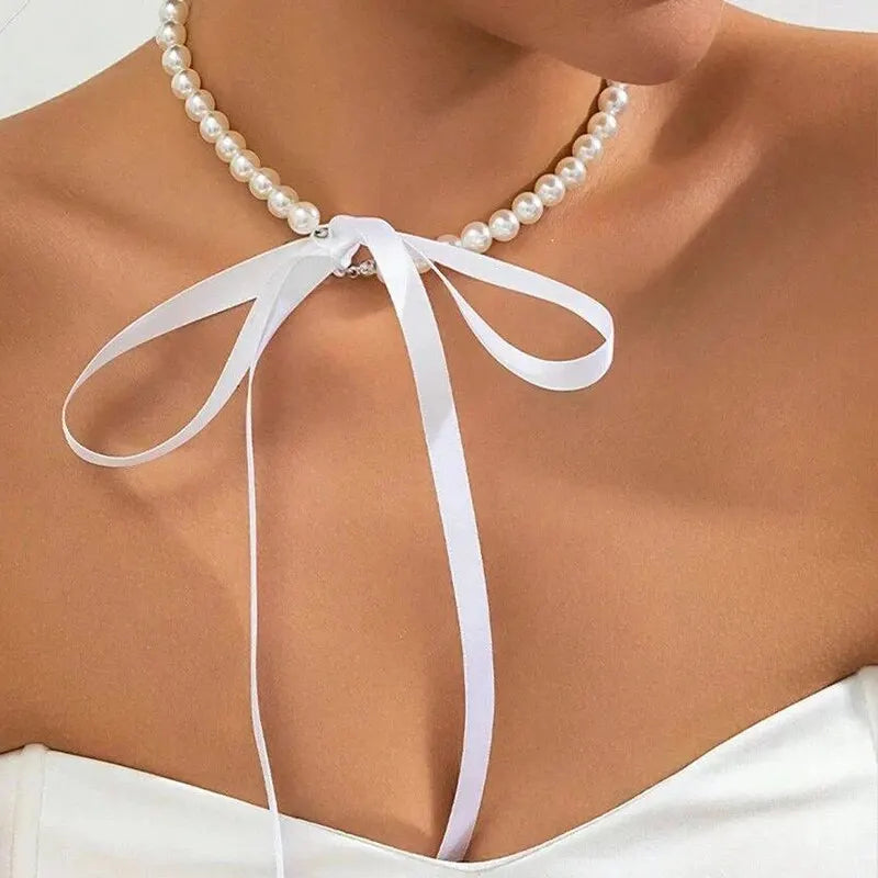 Halsband dam – pärlchoker med rosett