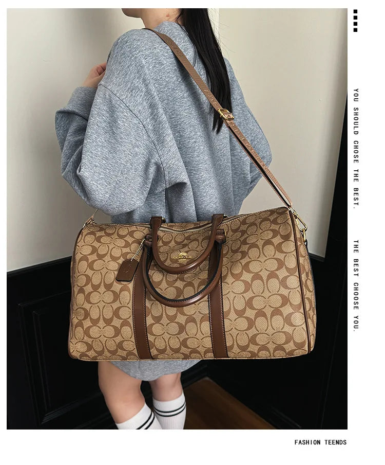Vintage weekendbag med monogrammönster