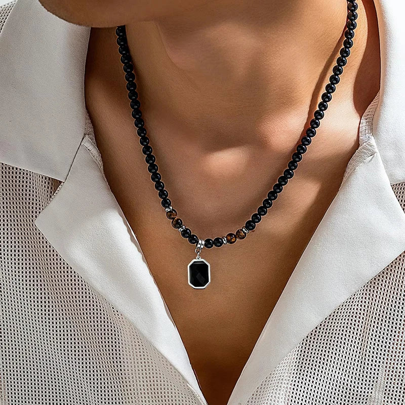 Tigeröga halsband herr – svart sten & geometriskt hänge
