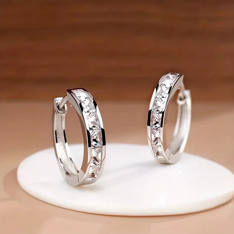 Örhängen dam – eleganta hoops cc-inspirerade
