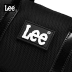 Svart Lee mini-handväska med dubbla handtag och justerbar axelrem.