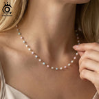 ORSA JEWELS damhalsband – fyrkantigt snäckskalshänge i 18K guldplätering