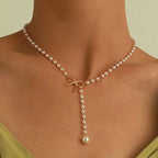 Halsband dam – pärlchoker med rosett svarta