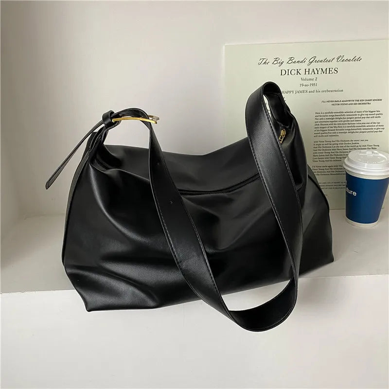 Väska dam – crossbody väska i läderlook med stor kapacitet