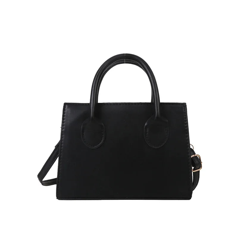 Stor damväska i PU med klassisk design och crossbody-funktion