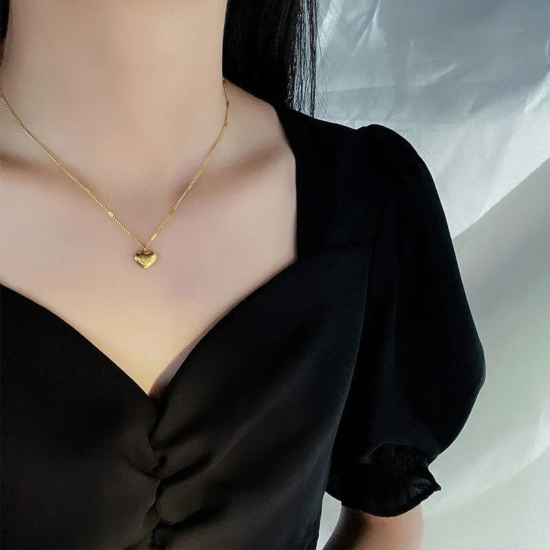 Guldpläterat halsband med hjärthänge och gravyr