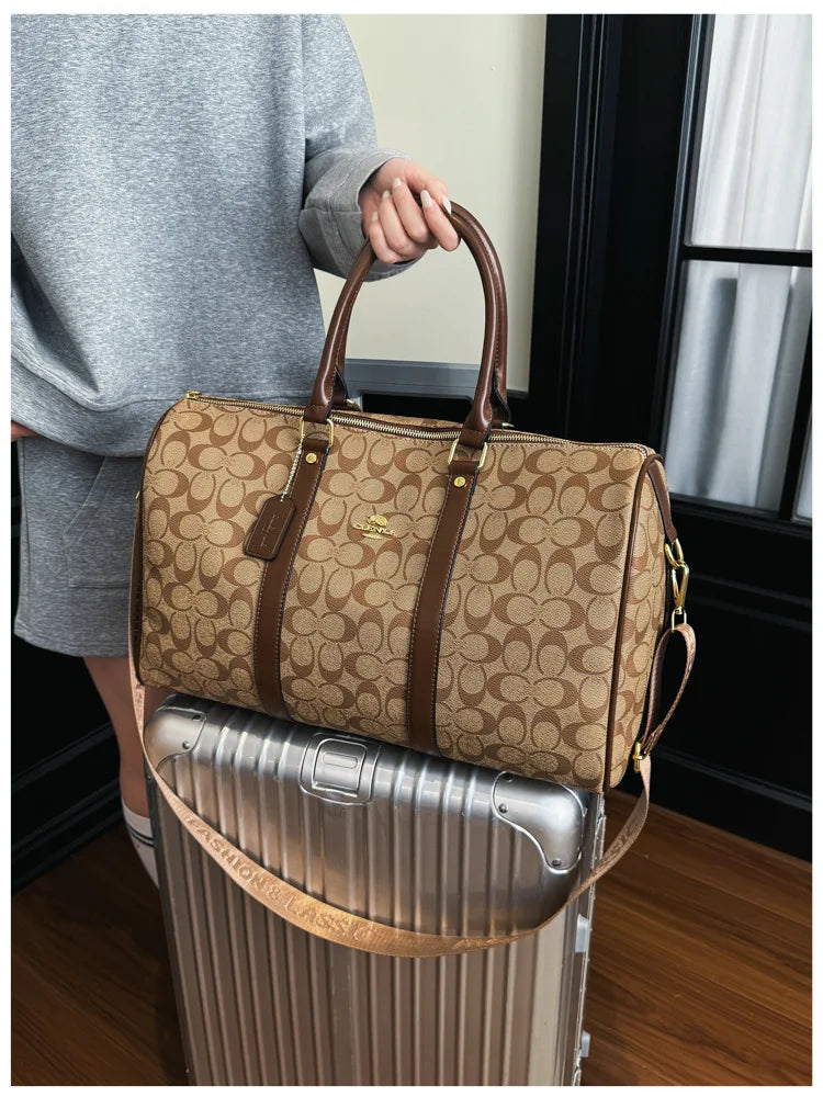 Vintage weekendbag med monogrammönster