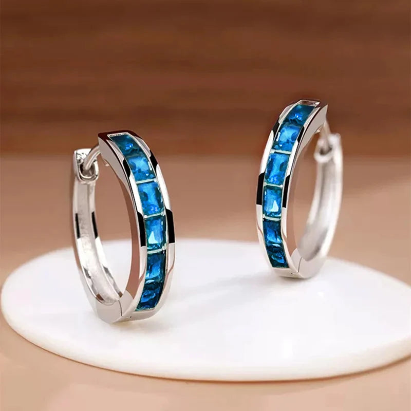 Örhängen dam – eleganta hoops cc-inspirerade