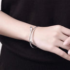 Armband i sterling silver med vattendroppe – Elegant och justerbart damsmycke