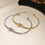 Rostfritt stål armband cuff i vintage stil – tvinnad design i guldfärg