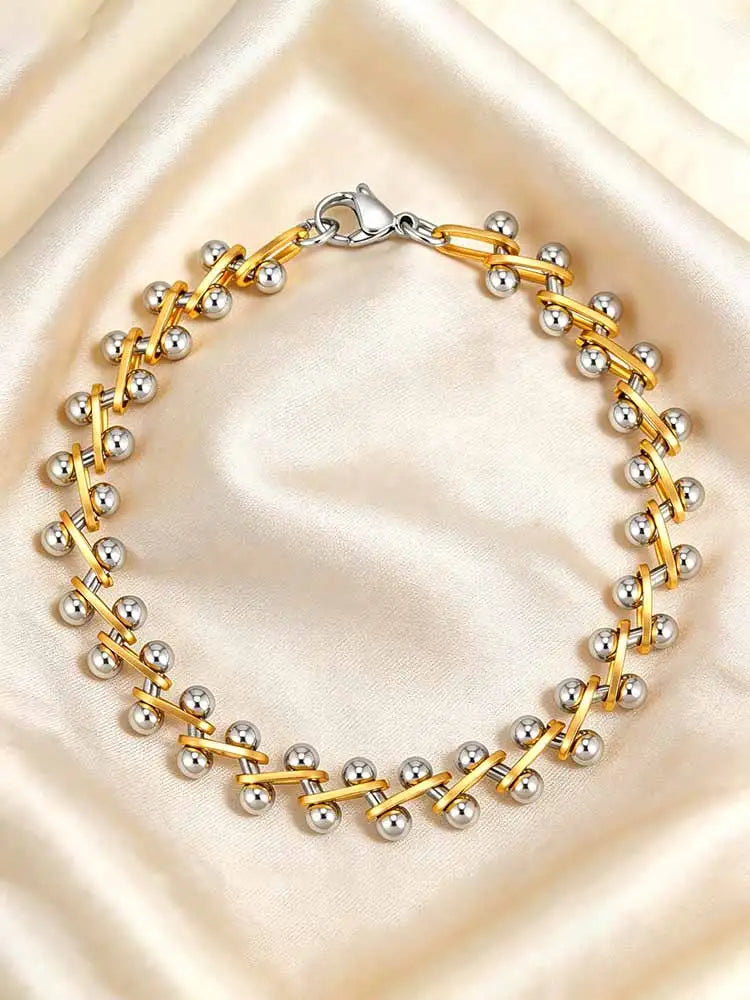 Meaeguet armband dam i guld och silver – minimalistiskt tvåtons armband
