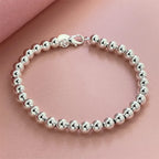 Silverarmband dam – 925 sterlingsilver med runda pärlor 6 mm
