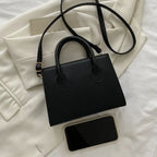 Stor damväska i PU med klassisk design och crossbody-funktion