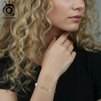ORSA JEWELS damarmband – blomma med zirkonia i rostfritt stål