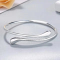 Armband i sterling silver med vattendroppe – Elegant och justerbart damsmycke