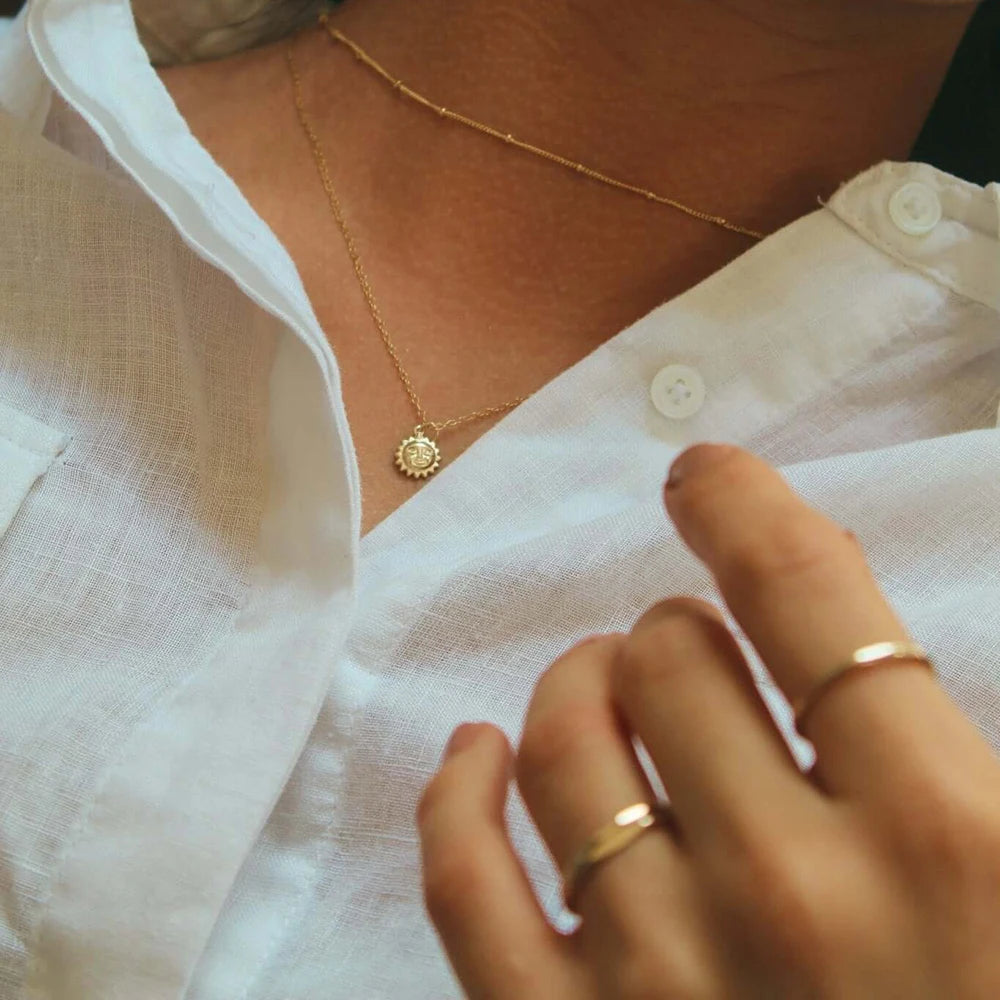 Guld choker halsband dam – solhänge