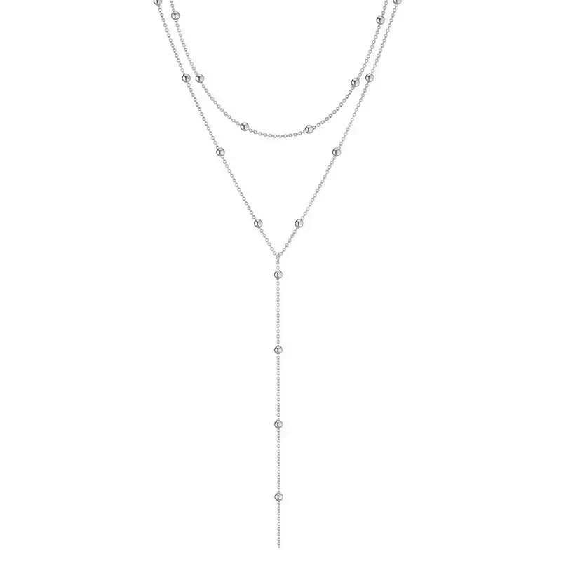 Halsband dam – dubbellager halsband med tofs i guldton