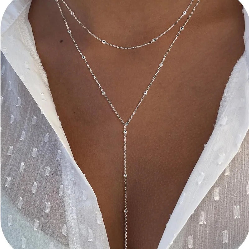 Guldpläterat lariat halsband i dubbla lager med dropphänge