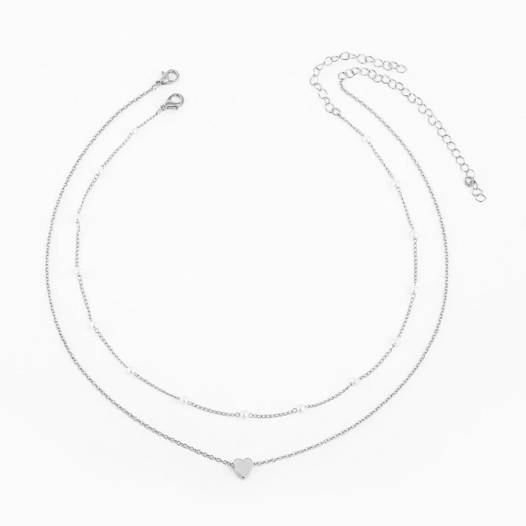 Halsband dam – flerlager halsband med hjärta i guldton