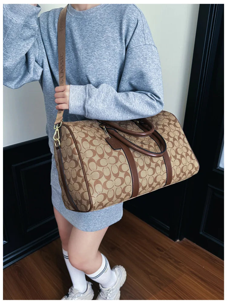 Vintage weekendbag med monogrammönster