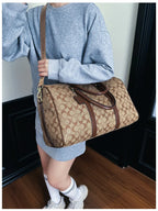Vintage weekendbag med monogrammönster