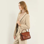 Axelväska i äkta läder dam – klassisk & kompakt crossbody