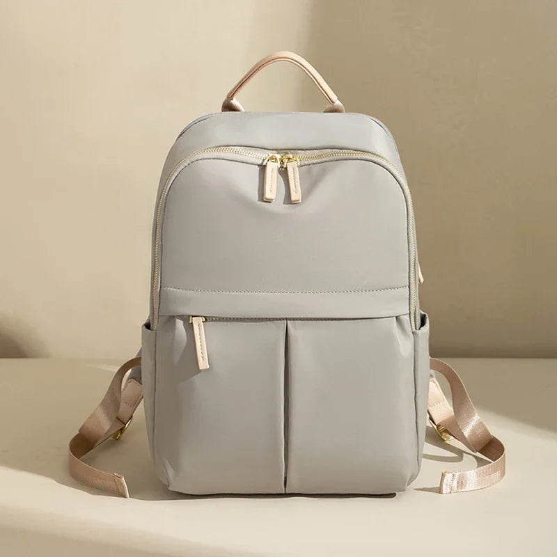 Rymlig datorryggsäck dam i Oxford-material 20–35 L
