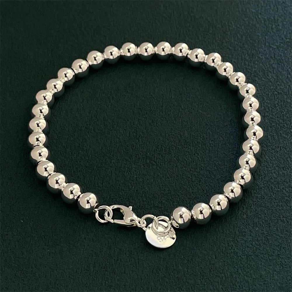 Silverarmband dam – 925 sterlingsilver med runda pärlor 6 mm