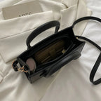 Stor damväska i PU med klassisk design och crossbody-funktion