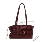 Damväska Suede Tote – stilren bucket bag med spänndetalj