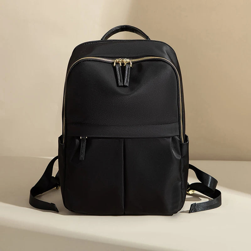 Rymlig datorryggsäck dam i Oxford-material 20–35 L