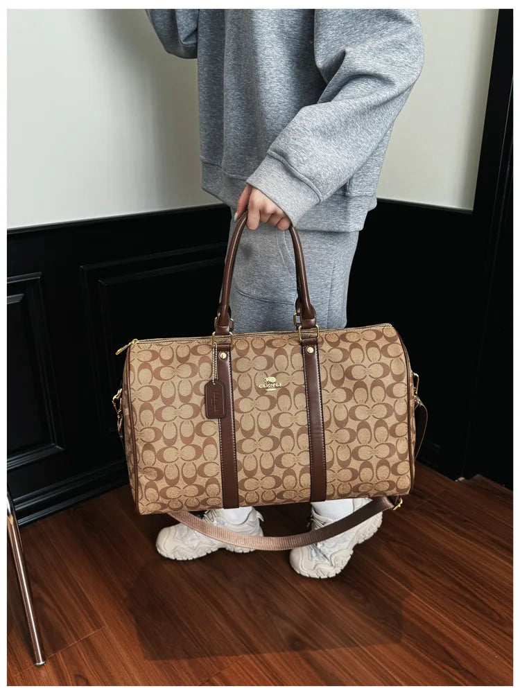 Vintage weekendbag med monogrammönster