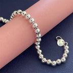 Silverarmband dam – 925 sterlingsilver med runda pärlor 6 mm