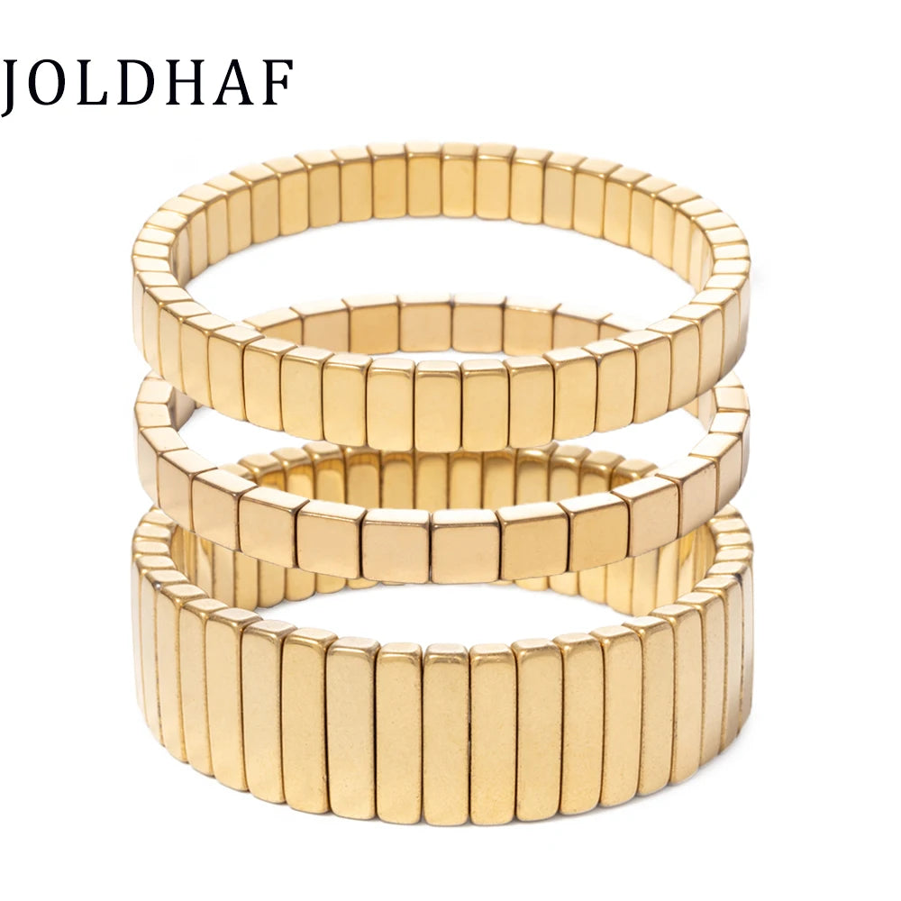 Guldfärgat pärlarmband med hematitpärlor – elastiskt armband för dam