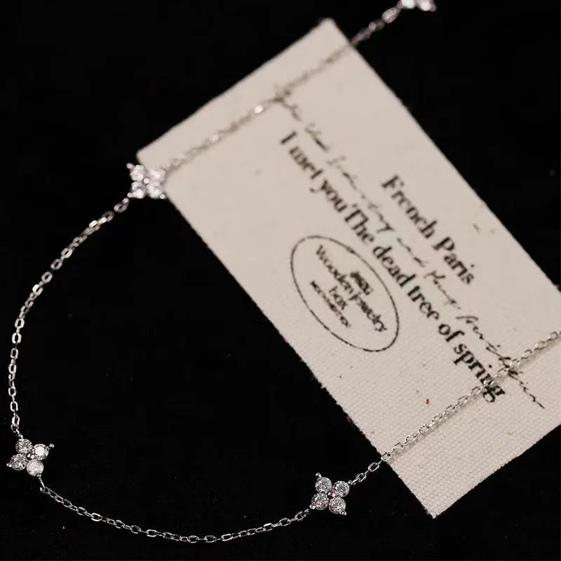 Lyckoklöver halsband i 925 sterling silver med guldplätering och CZ-blommor