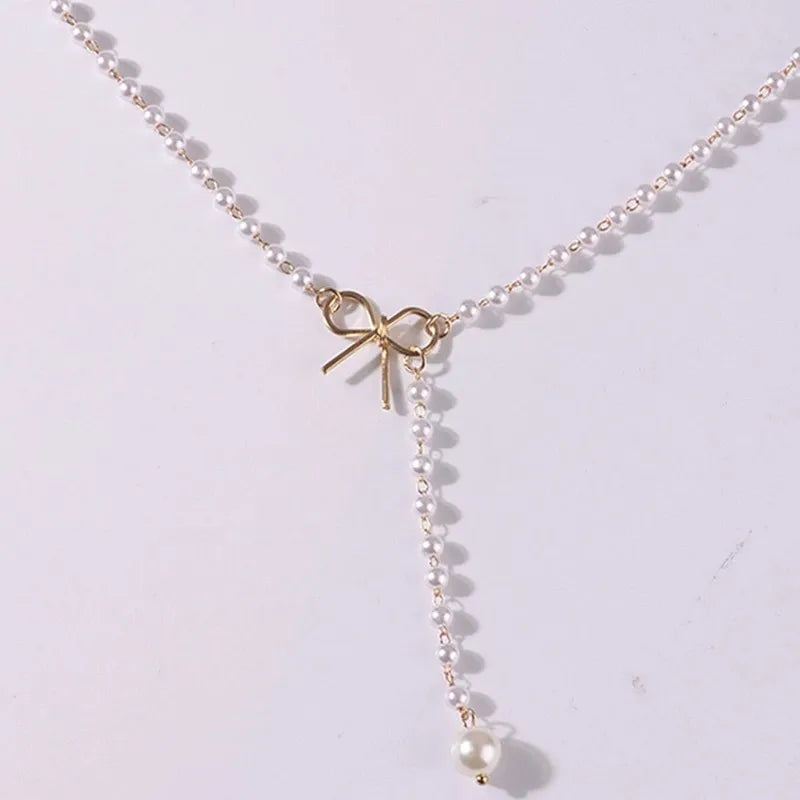 Halsband dam – pärlchoker med rosett svarta