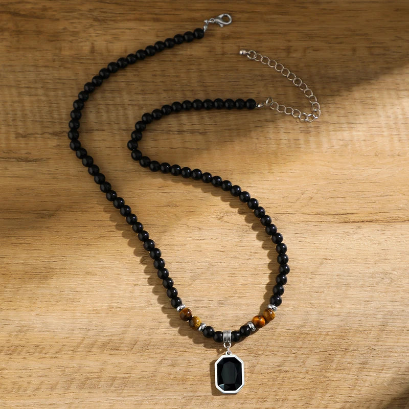 Tigeröga halsband herr – svart sten & geometriskt hänge