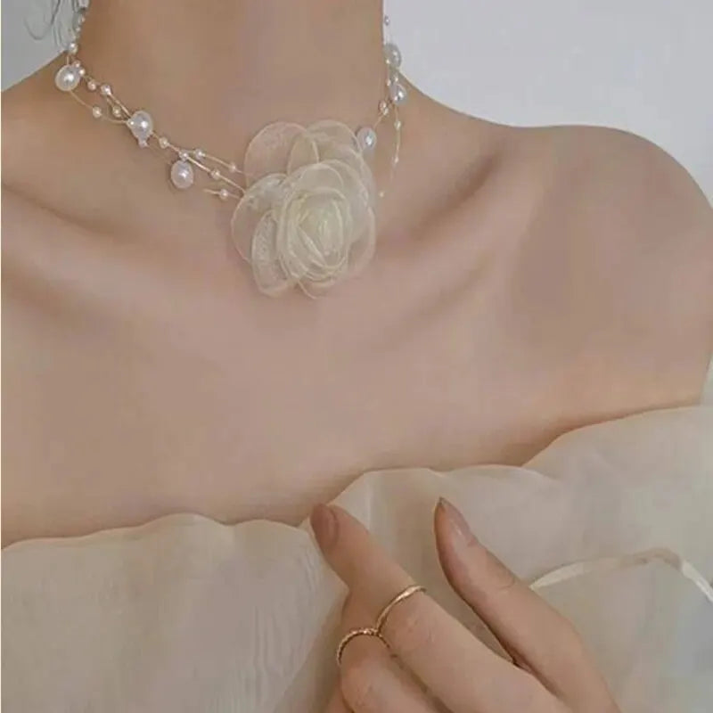 Halsband dam – pärlchoker med rosett