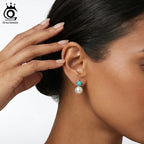 ORSA JEWELS pärlörhängen med turkos – 925 sterlingsilver